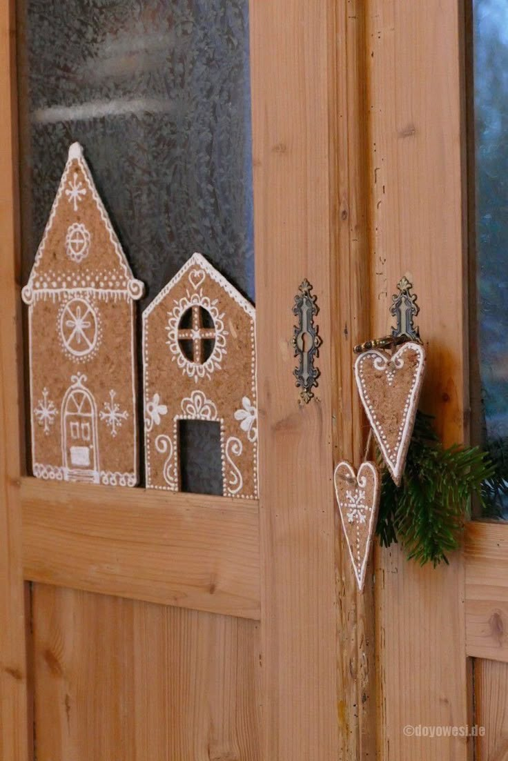 the door is decorated with gingerbread houses