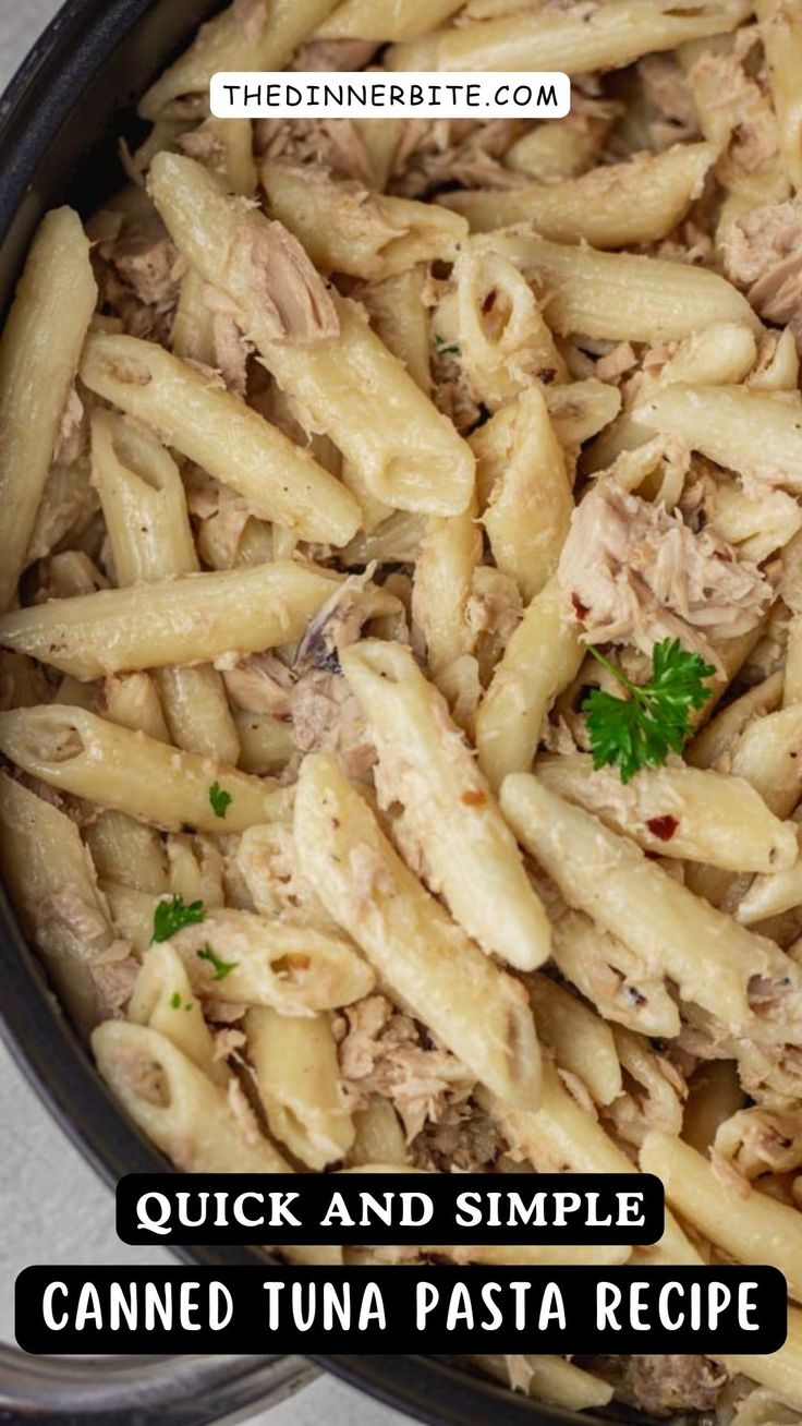 a pan filled with pasta and meat on top of a table