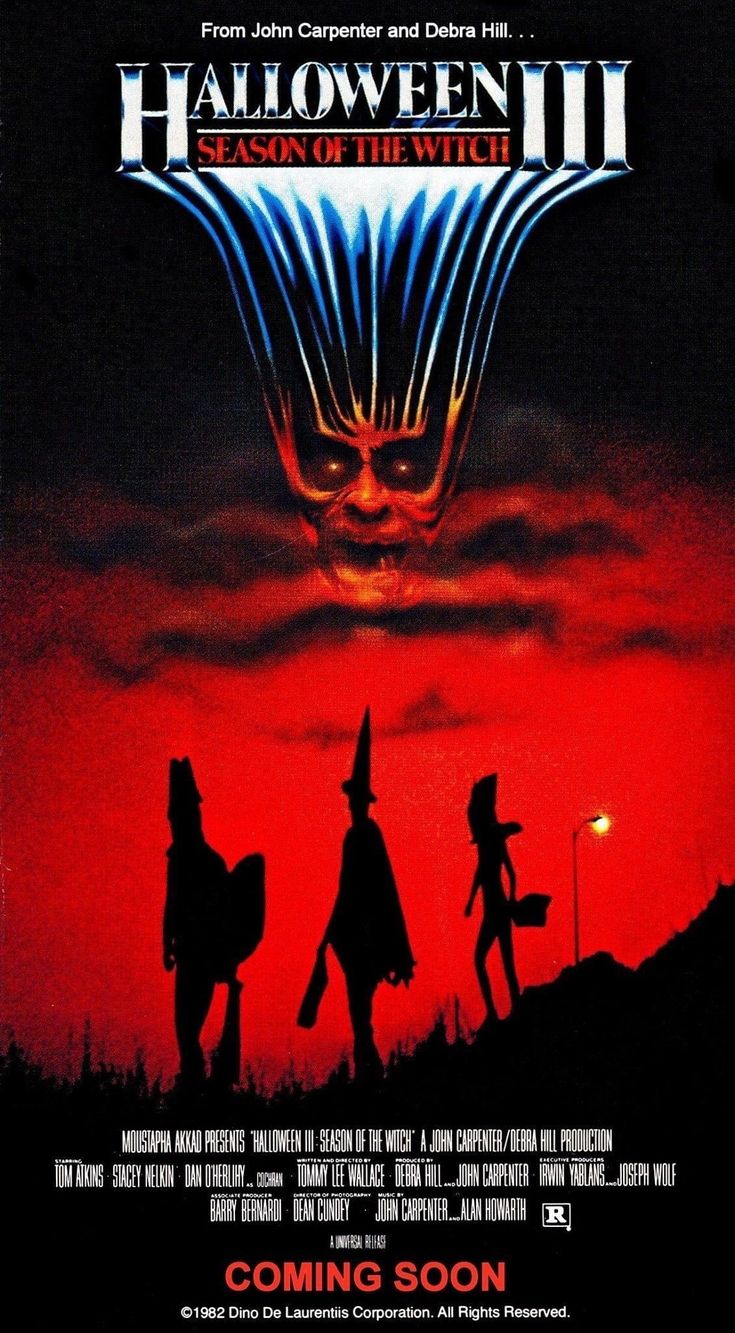 the movie poster for halloween ii, which features two witches and an evil man in silhouette