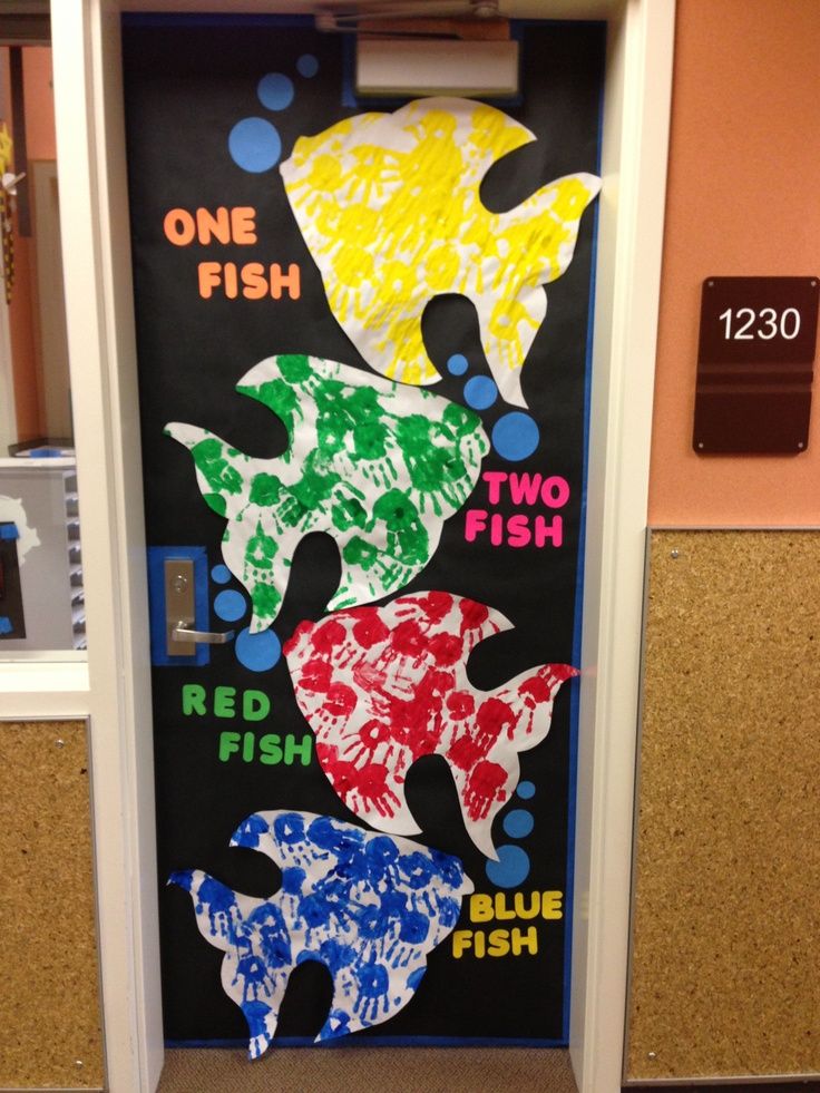 an open door with different colored fish on it