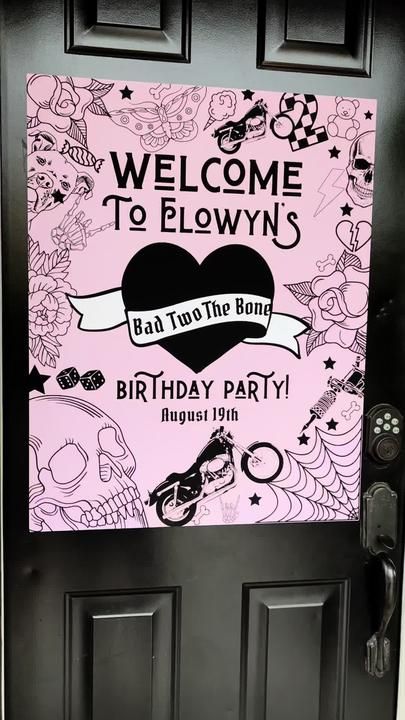 a welcome sign is posted on the front door to a birthday party at bad too the bone