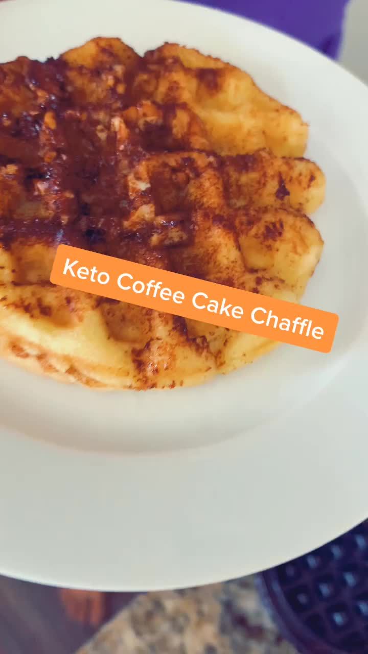 a white plate topped with waffles covered in keto coffee cake chaffle