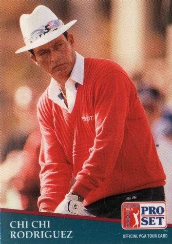 a man in red shirt and white hat playing golf