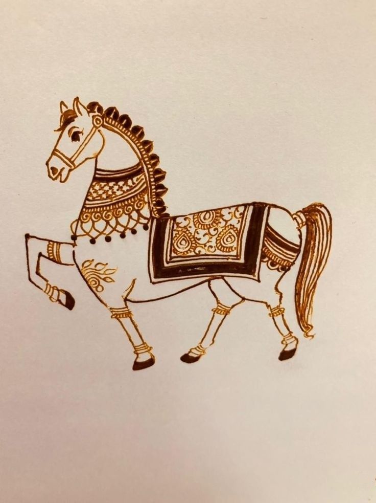 a drawing of a horse is shown on a piece of paper with gold trimmings