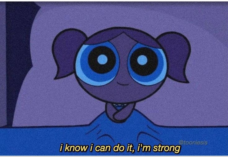 a cartoon elephant with big eyes and blue eyes sitting in the middle of a bed