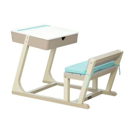 a white desk with a blue seat next to it