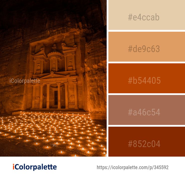 the colors in this image are orange, brown, and tan with white lights ...