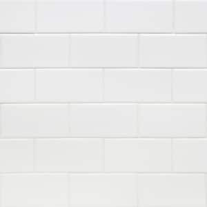 a white tiled wall with no one in it