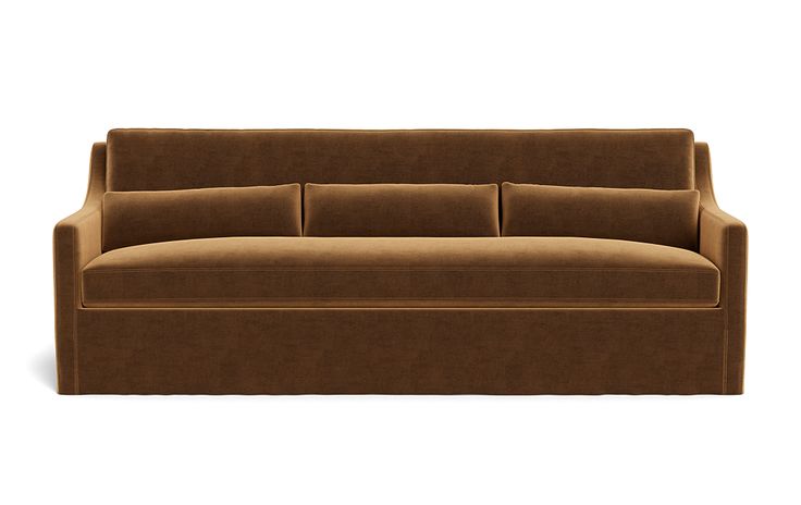 a brown couch sitting on top of a white floor