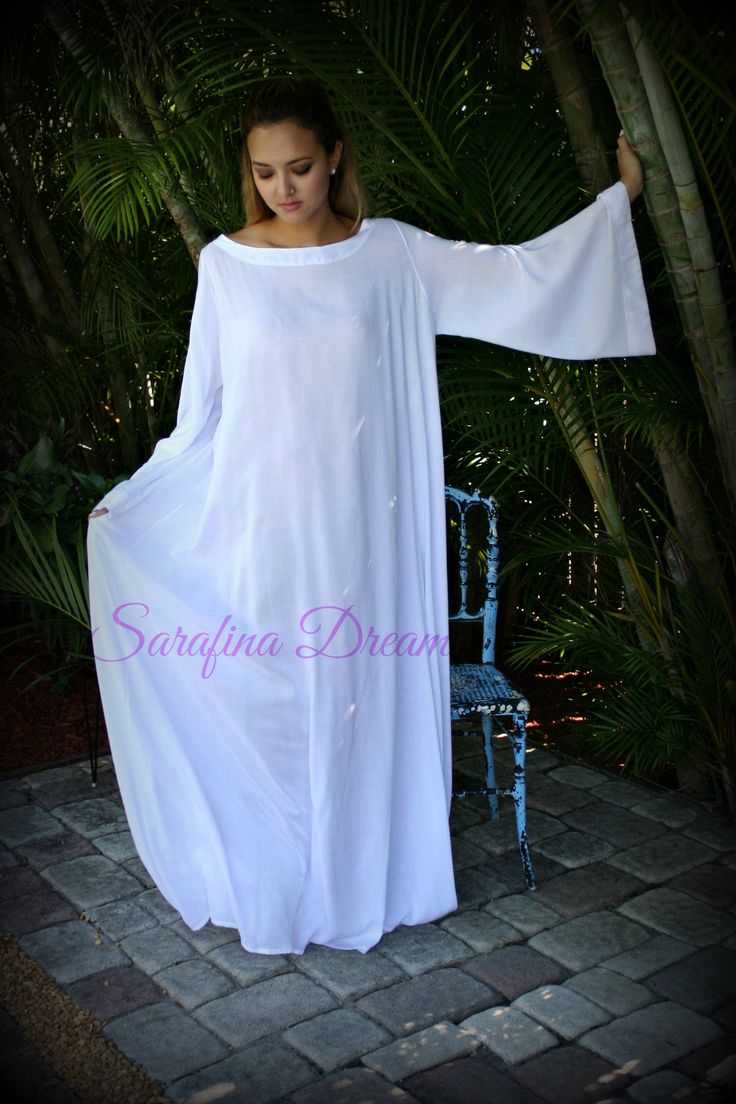 "Cut off to receive in time for Christmas has passed. Any orders placed as of 11/26 are not guaranteed for Christmas delivery. Turnaround time is 4 weeks to ship from date ordered. Simple, romantic, elegant and reminiscent of Jane Austen ease. 100% white cotton, banded angel bell sleeves and banded wide neckline with a comfortable loose free fall silhouette. A cotton nightgown that has a classic, timeless style not sacrificing comfort. Available as shown in white cotton. If you'd like to customi Fall Silhouette, White Cotton Nightgown, Nightgown Pattern, White Nightgown, Cotton Nightgown, Cotton Sleepwear, Angel Sleeve, Women's Nightgowns, Nightgowns For Women