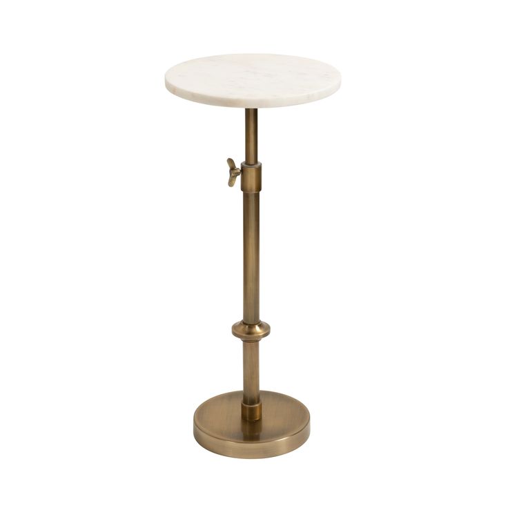 a white marble top and brass metal base bar stool with an adjustable footrest,