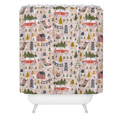 a shower curtain with an image of cars and trees on the outside, in pink