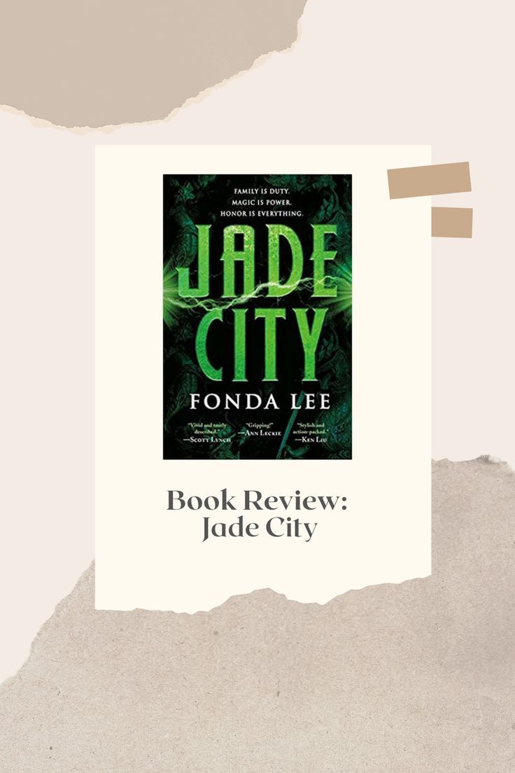 the book review jade city by fonda lee is featured in front of a torn piece of paper