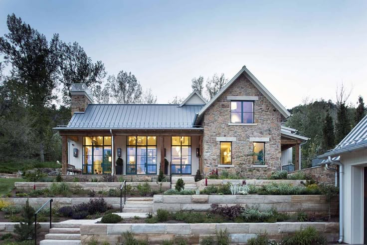 a stone house with steps leading up to it