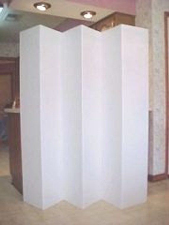 the room divider is made out of white paper and has three lights on each side