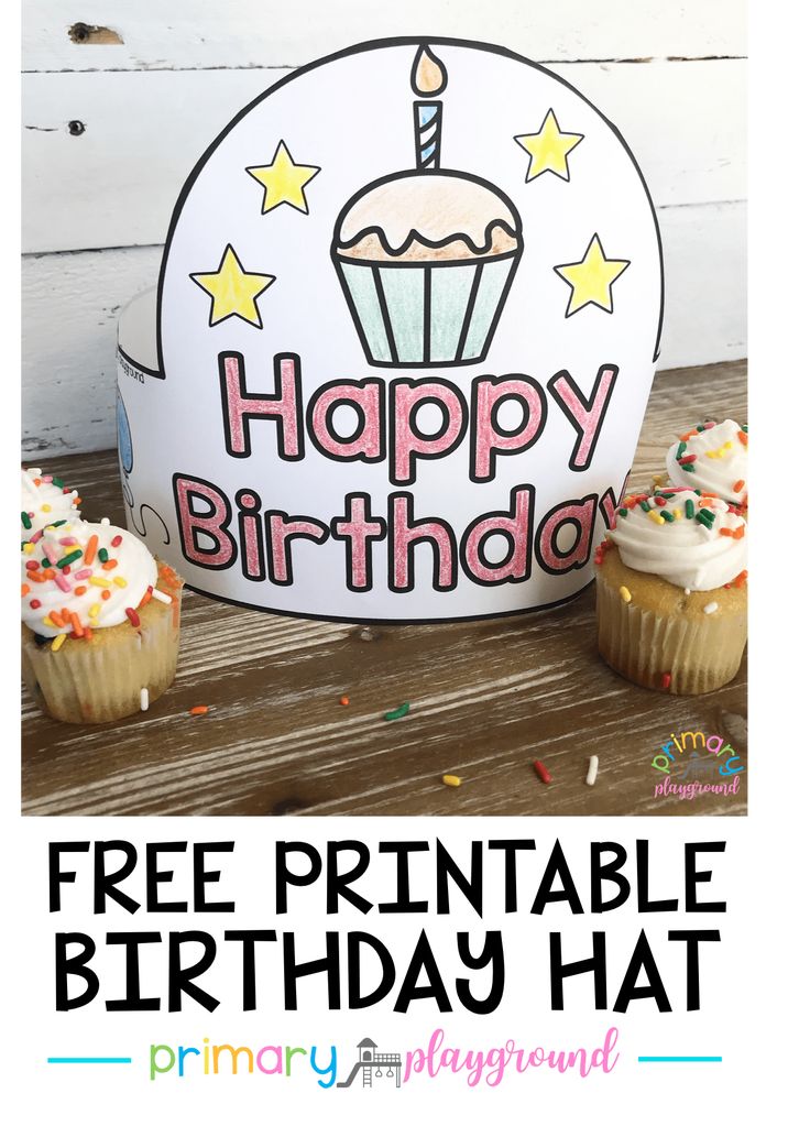 a birthday hat with cupcakes and sprinkles in front of it