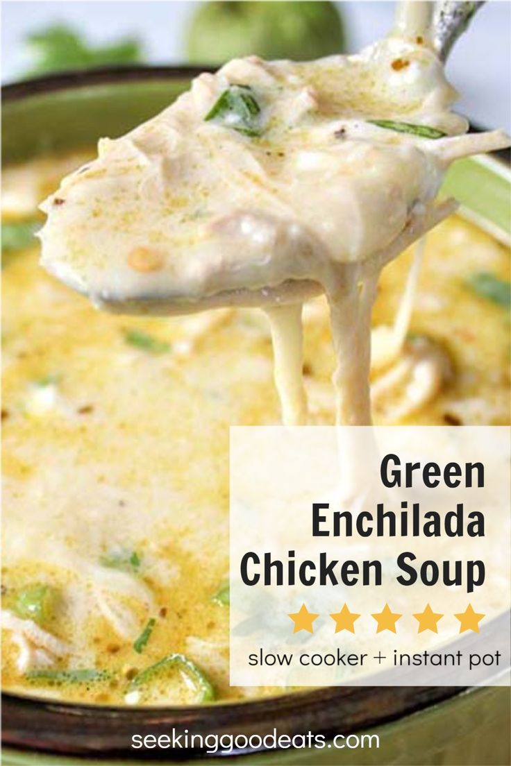 the green enchilada chicken soup is being lifted with a spoon