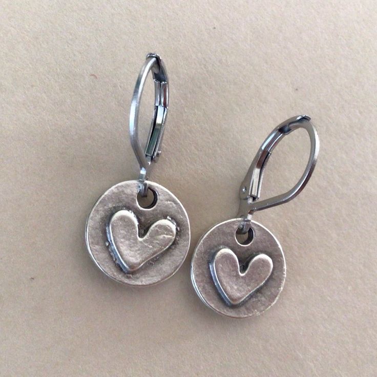 Great Everyday Style Exclusive Earrings New Super Cute! 0.8” Total Length, 11mm Width Antique Tone Sterling Silver Plated Metal Hammered Heart Charms, Leverback Wires Oxidized Sterling Silver Plated Stainless Steel Perfect Simple Minimalist Dangle Drop Earrings Bestseller Style Great Gift Idea Handcrafted Artisan One Of A Kind Earrings Handmade In Us Fast Shipping From California Please Review My Other Exclusive Handcrafted Artisan Jewelry On Sale Additional 10% Discount With Bundle 2+ Handcrafted Earrings Handmade, Metal Earrings For Valentine's Day, Dainty Adjustable Heart-shaped Earrings, Dainty Adjustable Heart Earrings, Everyday Metal Dangle Heart Earrings, Small Hypoallergenic Earrings For Everyday, Nickel-free Heart Shaped Drop Earrings For Everyday, Adjustable Heart-shaped Everyday Earrings, Everyday Adjustable Heart-shaped Earrings