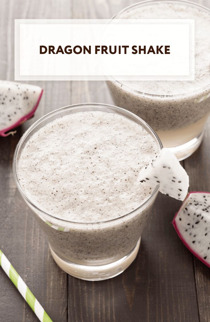 dragon fruit shake in two glasses on a wooden table