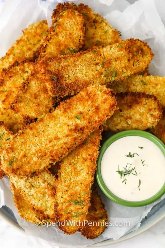 fried fish sticks with ranch dressing on the side