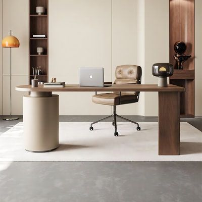 a desk with a laptop on it in an empty room next to a bookcase