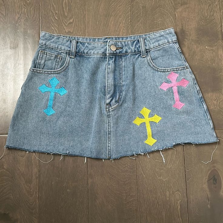 Denim Mini Skirt With Embroidered Crosses. Frayed Bottom. Nwot. Denim Skirt Design Ideas, Costumized Clothes, Custom Denim Skirt, Painting Skirt, Jeans Painting, Cross Skirt, Patch Skirt, Embroidered Denim Skirt, Denim Upcycle