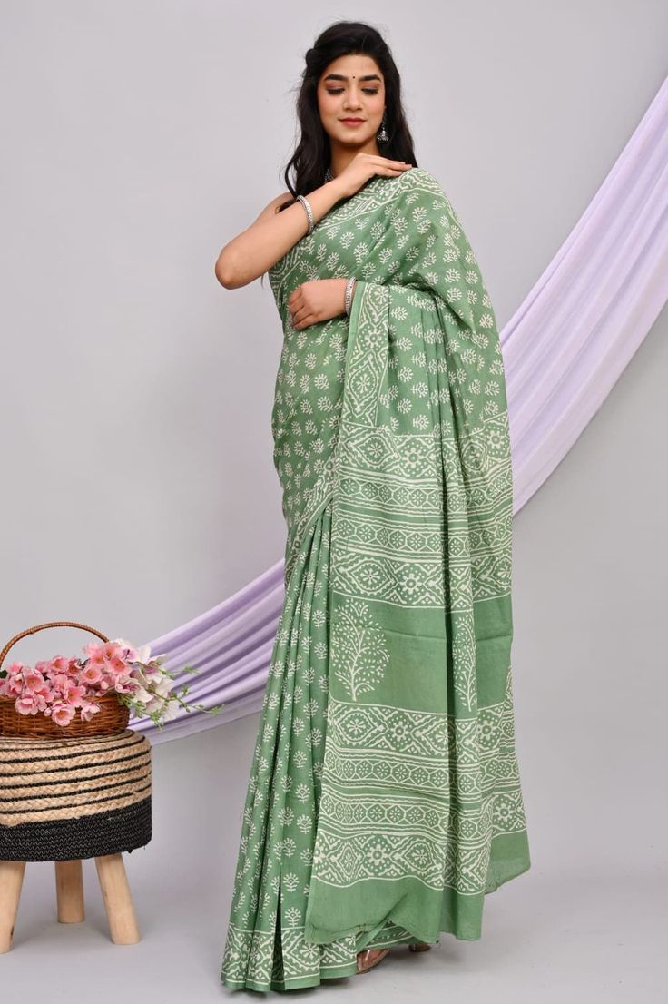 1. 100% Cotton 2. Hand Block Kalamkari Print 3. Imported 4. Machine Wash 5. Made in India 6. Occasion :- Evening Wear, Cocktail, Festive wear, Party Wear, Wedding wear, Dating, Banquet, Formal Wear and Perfect gift for your Sister, Mother, Friend or Loved Ones. A beautiful Hand Block Print Cotton Saree Looks beautiful on you and your loved ones. The fabric is properly used for women clothing and is very comfortable and light weight. About FALL and EDGE These handmade beauties should be treated w Cotton Saree With Chikankari Embroidery, Festive Cotton Pre-draped Saree With Block Print, Bollywood Style Cotton Pre-draped Saree For Puja, Bollywood Cotton Pre-draped Saree For Wedding, Green Fitted Bohemian Pre-draped Saree, Green Cotton Saree With Chikankari Embroidery, Cotton Saree With Chikankari Embroidery For Navratri, Eid Semi-stitched Cotton Saree, Fitted Cotton Saree With Dupatta