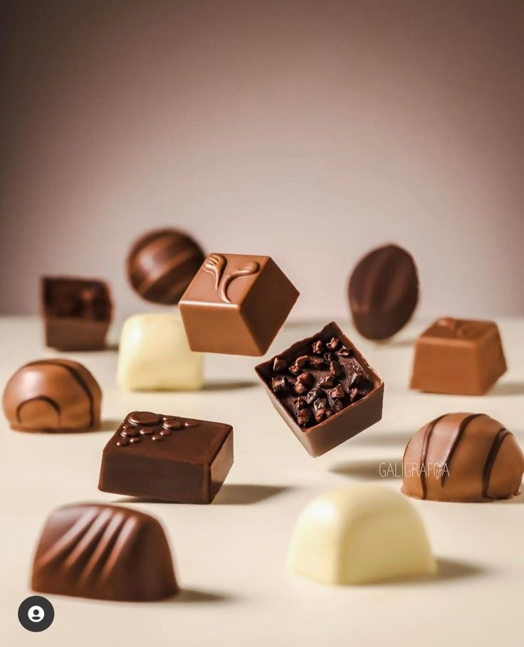 many different types of chocolates on a table