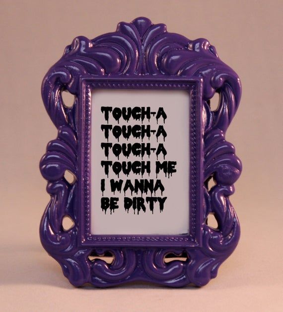 a purple frame with the words tough as tough as though i touch me i wanna be pretty