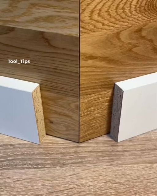 two different types of wood flooring with white and brown trim on the bottom half