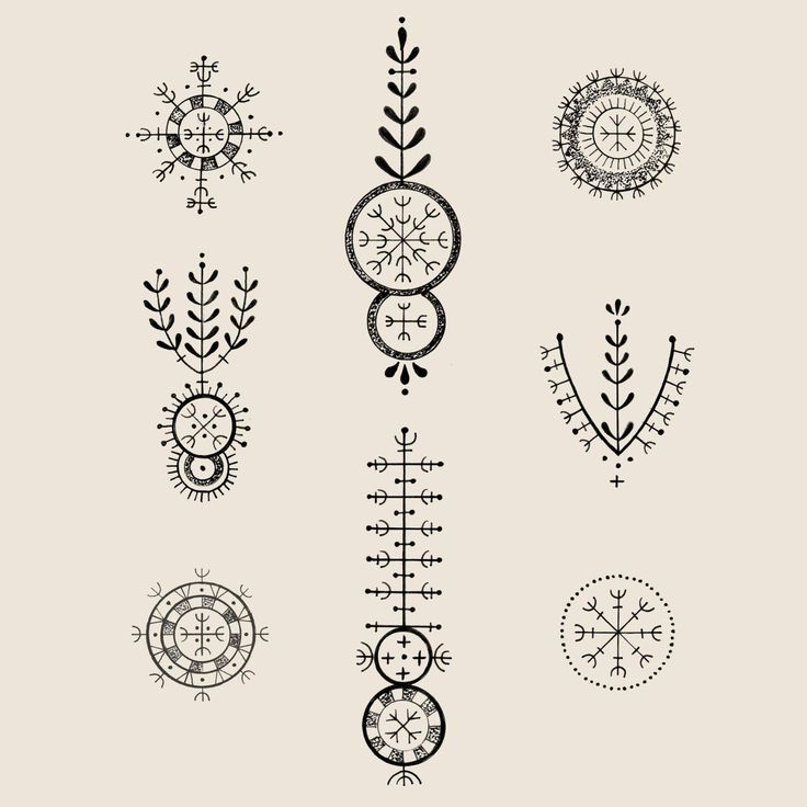 an assortment of different designs on a white background, including arrows and compasss in black ink