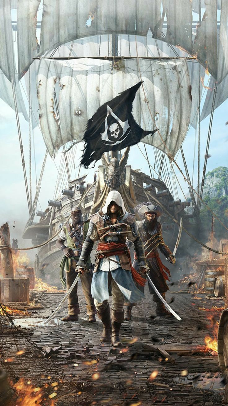 a group of men standing next to each other in front of a boat with a pirate flag on it