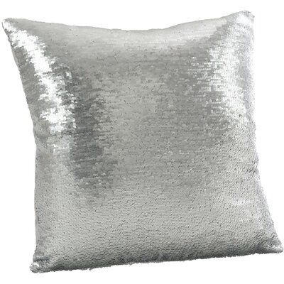 a silver sequin pillow on a white background