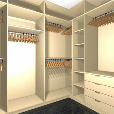 an open closet with lots of white drawers