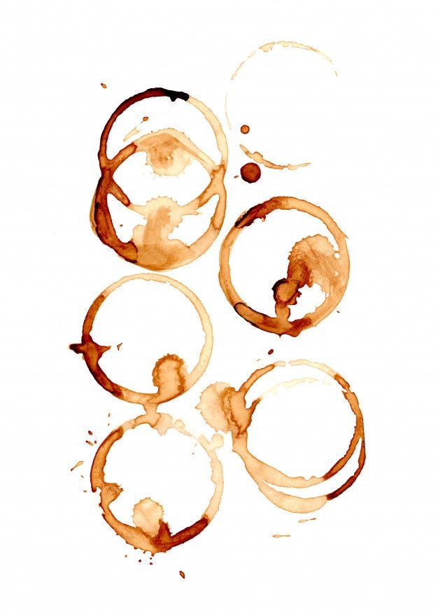 coffee stains are arranged in the shape of circles