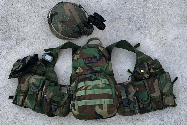 the vests and helmet are laid out on the ground