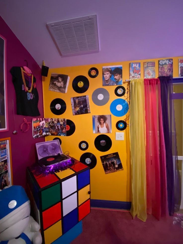 a brightly colored room with records on the wall