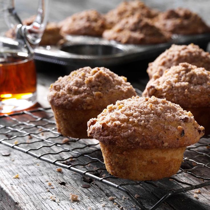 several muffins cooling on a wire rack