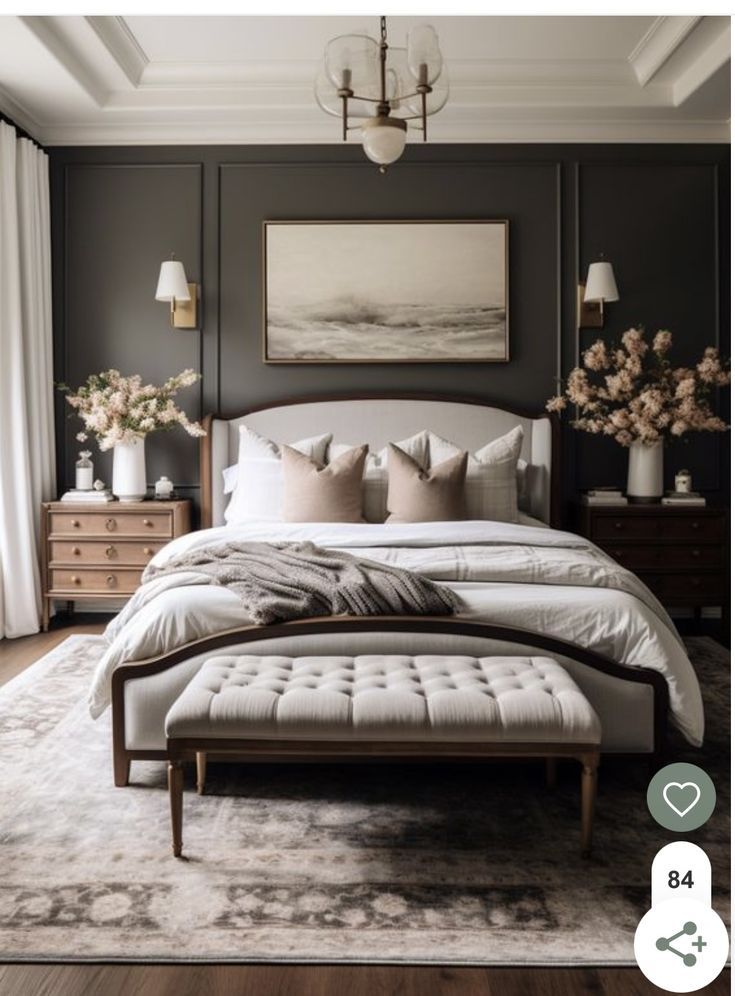 a large bed sitting in a bedroom on top of a wooden floor next to a window