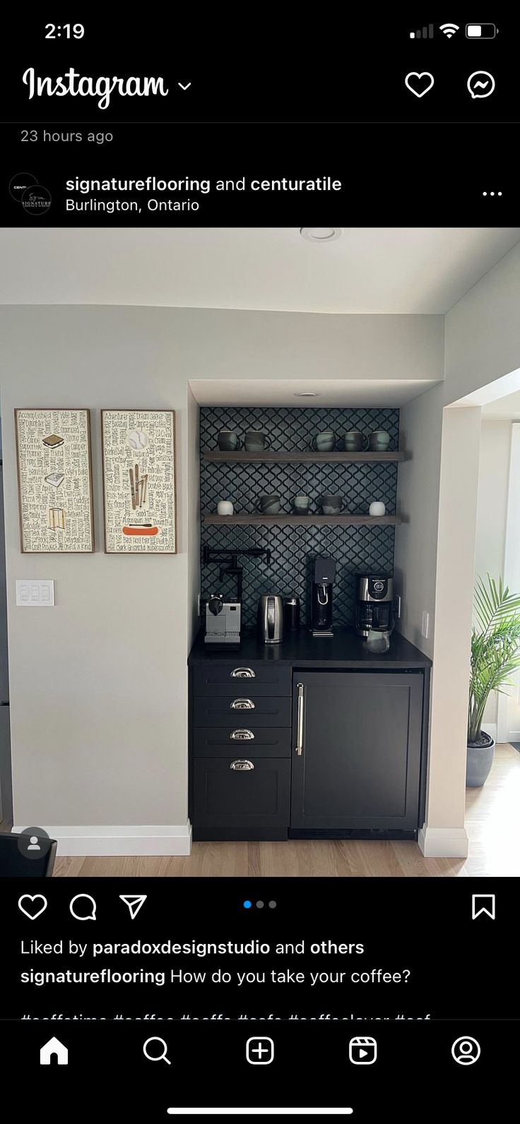 the instagram page on instagram com shows an image of a kitchen with black cabinets and appliances