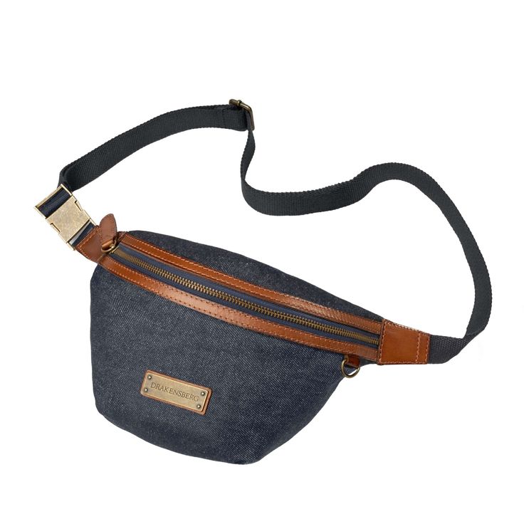 Waist Bag made of water-repellent canvas with leather details, the ideal companion for travel for men and women - Can be worn as a waist bag or diagonally across the body - Universal size, adjustable belt length: Waist 90-130cm - Front: Easily accessible large zipper compartment - Inside and on the back each 1 zipper compartment - Includes: 1 waist bag and 1 dust bag Color: Denim Blue Weight: 250g Capacity: 4 Liters Dimensions in cm (HxLxW): 16 x 25 x 10 Material exterior: Cotton (canvas) and bu Buffalo Leather, Hip Bag, Adjustable Belt, Looks Vintage, Waist Bag, Denim Blue, Vintage Look, Fanny Pack, Vintage Looks