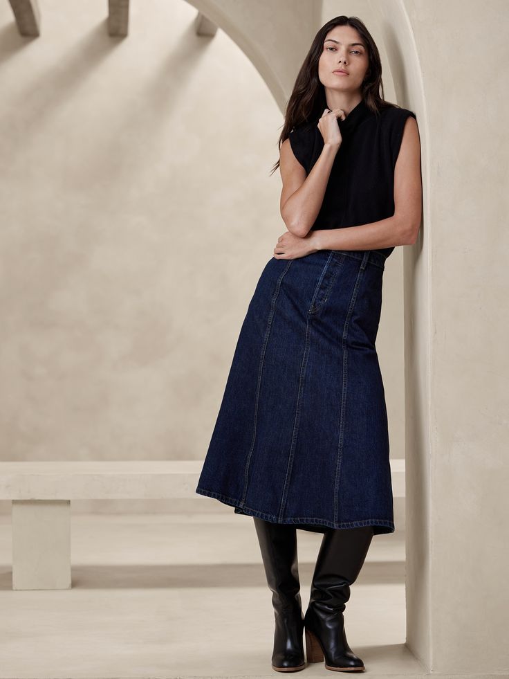 Our newest denim skirt strikes a meticulous balance between rugged and feminine with an irresistible silhouette constructed of rich, rigid denim from Italy.  We added panel seams for added dimension that enhances the sweep of the skirt.  A-line.  Fabric from Italy's Candiani Mill.  Organic: Made with certified, organically grown cotton that's easier on the earth.  Button fly.  Belt loops.  Unlined.  A-line.  Midi length.  Model: Size 2, 5'10" (178cm). Fall Jackets Outfit, Madewell Fall, Summer Wardrobe Staples, Jean Skirts, Trendy Denim, Midi Denim, Denim Skirts, Denim Midi Skirt, Skirts Online