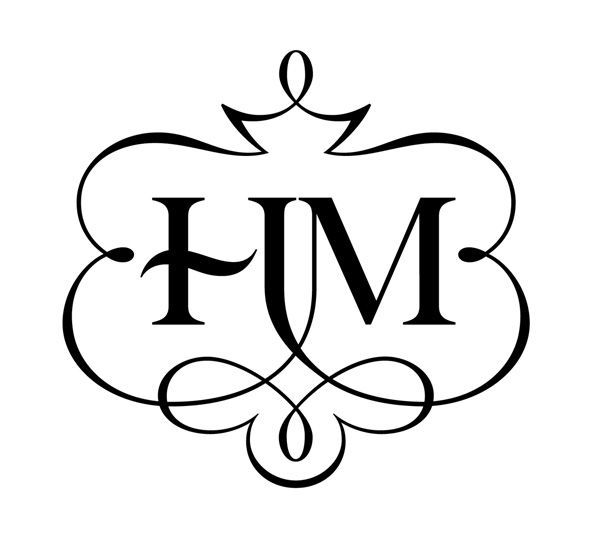 the f m logo is shown in black and white, with an ornate crown above it