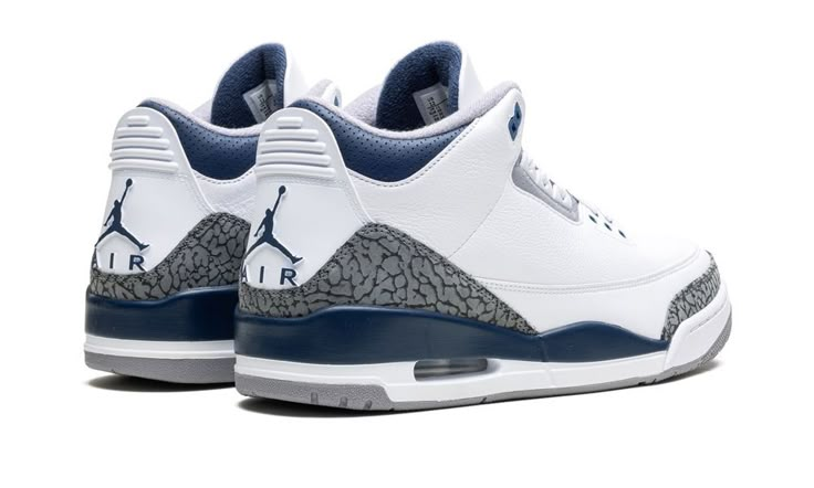 The Air Jordan 3 "Midnight Navy" is a colorway of the retro basketball shoe with navy accents.  Michael Jordan’s third signature shoe in the “Midnight Navy” colorway features a white leather upper with elephant print overlays on the toe and heel.  A Midnight Navy-colored mudguard contrasts the look, as do the Midnight Navy eyelet holes.  More Midnight Navy accenting is featured on the Jumpman on the white leather tongue and on the Jumpman on the heel.  The white midsole has a visible Air bubble Cute Shoes Aesthetic, Birthday Sneakers, Jordan 3 Midnight Navy, Jordan Ideas, Shoes Dunks, Jordans Dunks, Dream Sneakers, 70s Converse, Bape Shoes