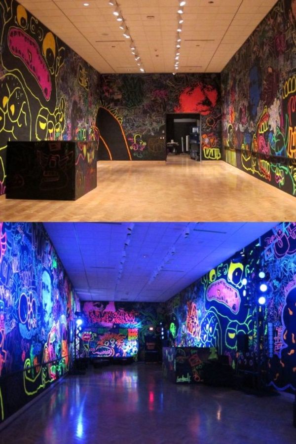 the inside of an art museum with graffiti on the walls and in the background there are lights