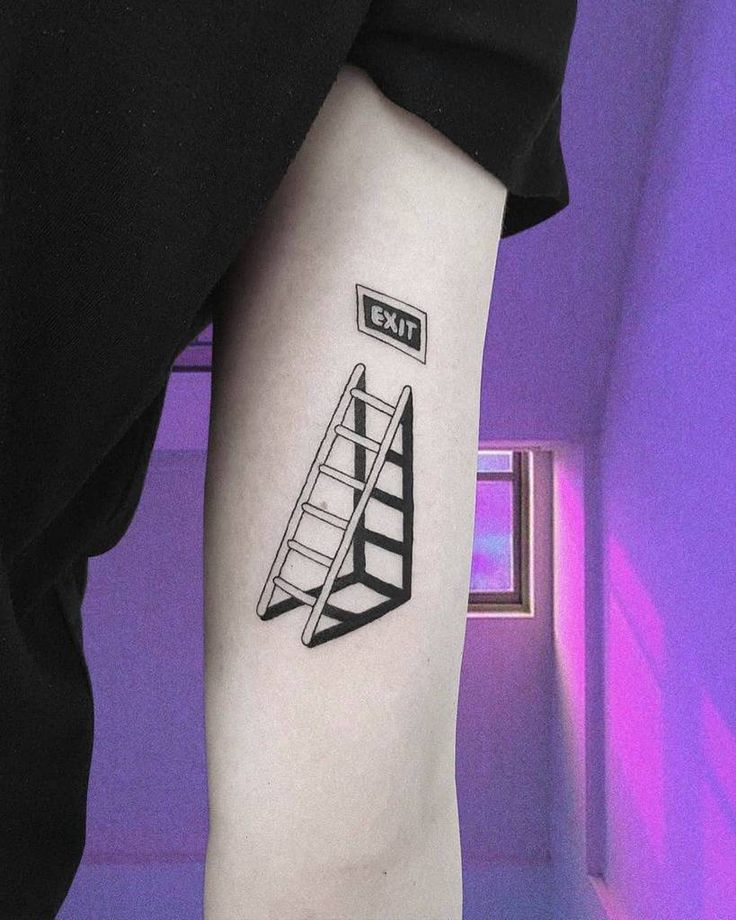 a black and white photo of a ladder tattoo