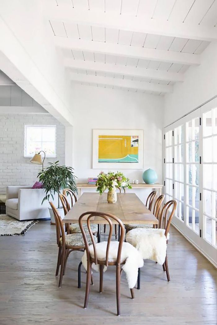 the dining room is clean and ready for us to eat dinner on it's long table