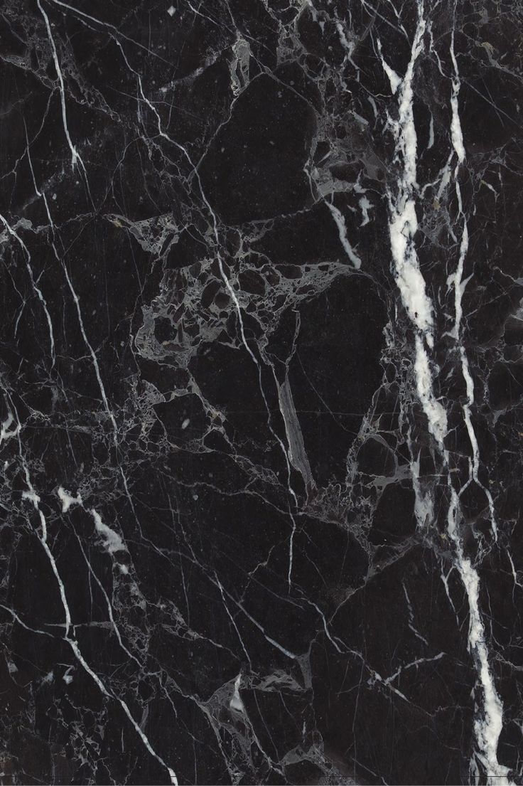 black marble with white streaks on it