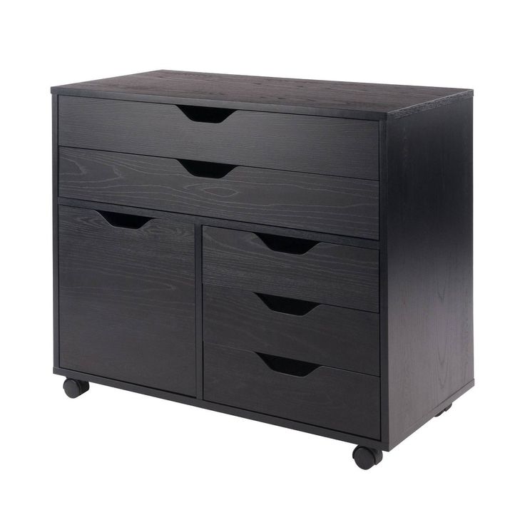 a black dresser with four drawers on wheels