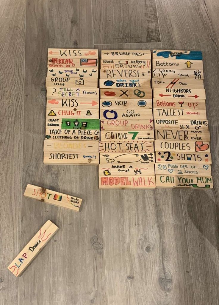 several pieces of wood that have been made with different types of letters and numbers on them